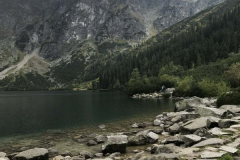 A-lake-with-a-mountain-in-the-background