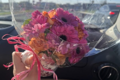 A-person-holding-a-bouquet-in-their-hand