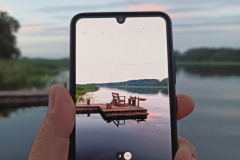 A-person-taking-a-picture-of-a-beach