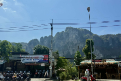 A-street-scene-with-a-mountain-in-the-background