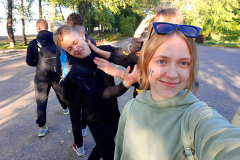 A young girl taking a selfie