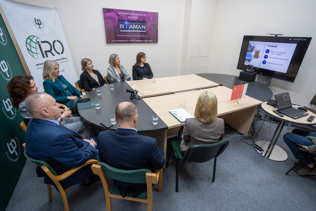several people at a meeting in a conference room