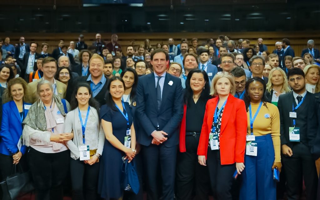 A large group of people pose for a photo