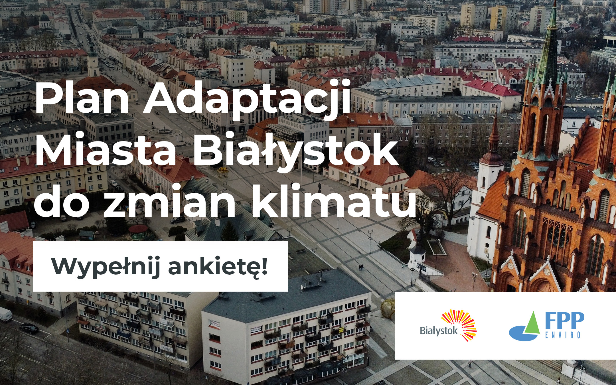 grafika ze zdjęciem w tle przedstawiającym centrum Białegostoku z lotu ptaka